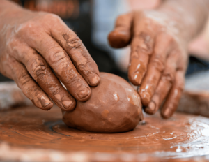hands in clay