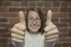 Person giving 2 Thumbs Up
